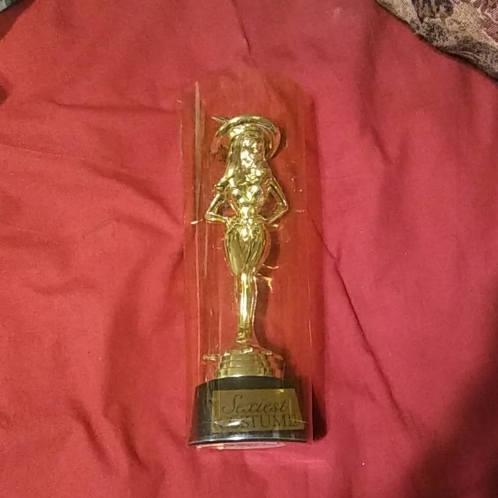 Plastic trophy for sexiest costume